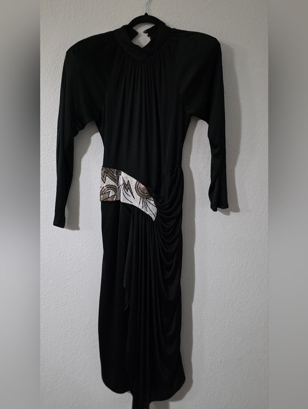 Black Long-Sleeve Draped Dress with Decorative Waist Panel